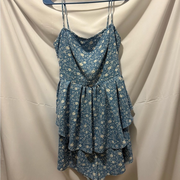 Floral Blue Ruffled Romper - Picture 1 of 3